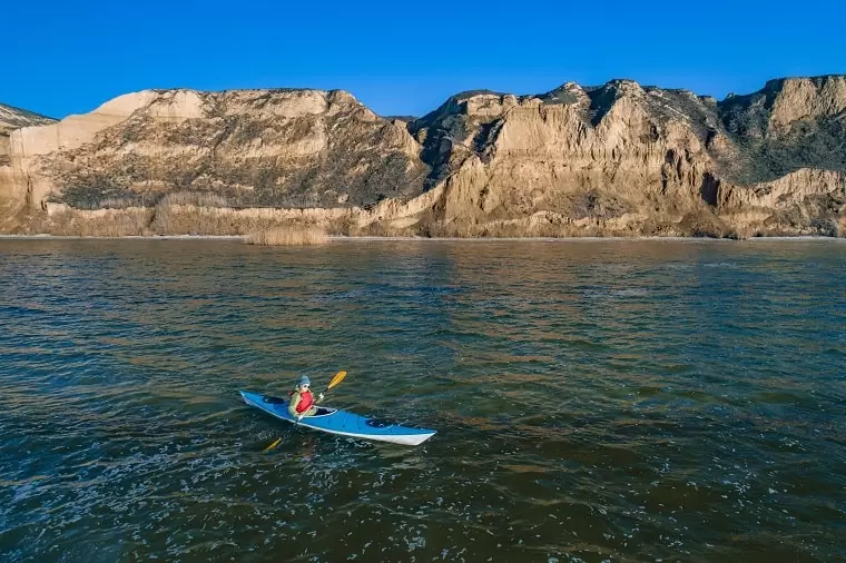 Stanislav rocks from water